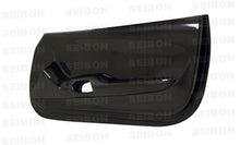 Load image into Gallery viewer, Carbon fiber door panels for 1993-1998 Toyota Supra - Seibon Carbon - DP9398TYSUP