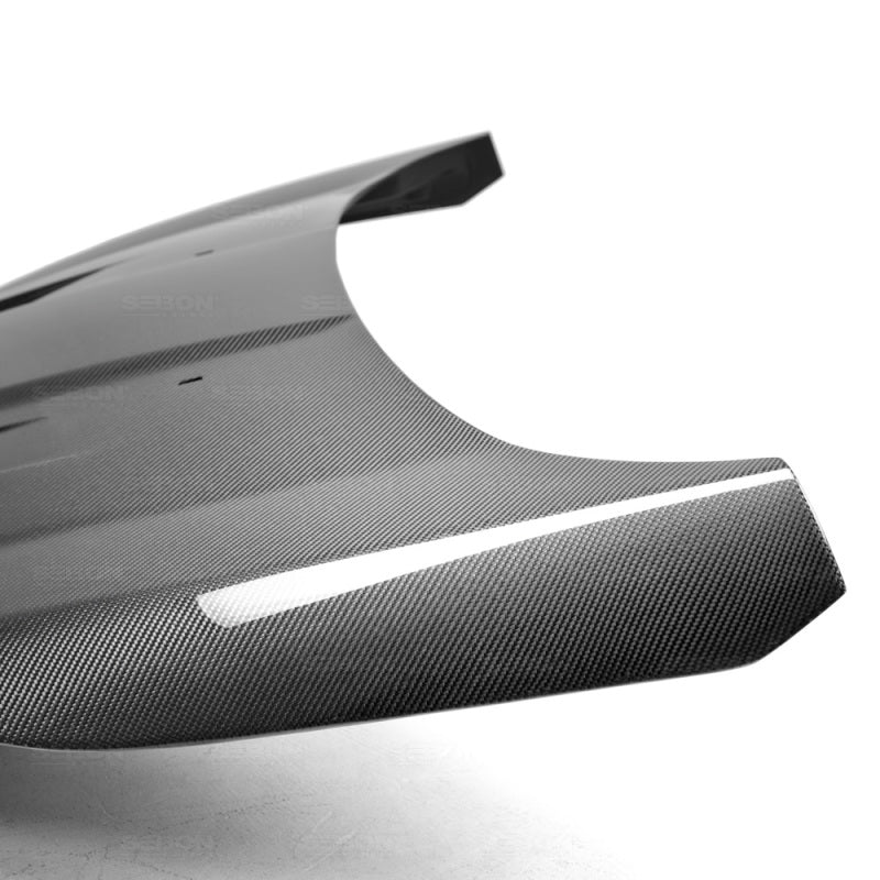 TM-style carbon fiber hood for 2014-2019 Ford Fiesta - Seibon Carbon - HD14FDFI-TM