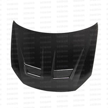 Load image into Gallery viewer, DV-style carbon fiber hood for 2010-2014 VW Golf / GTI (Shaved) - Seibon Carbon - HD1011VWGTIB-DV